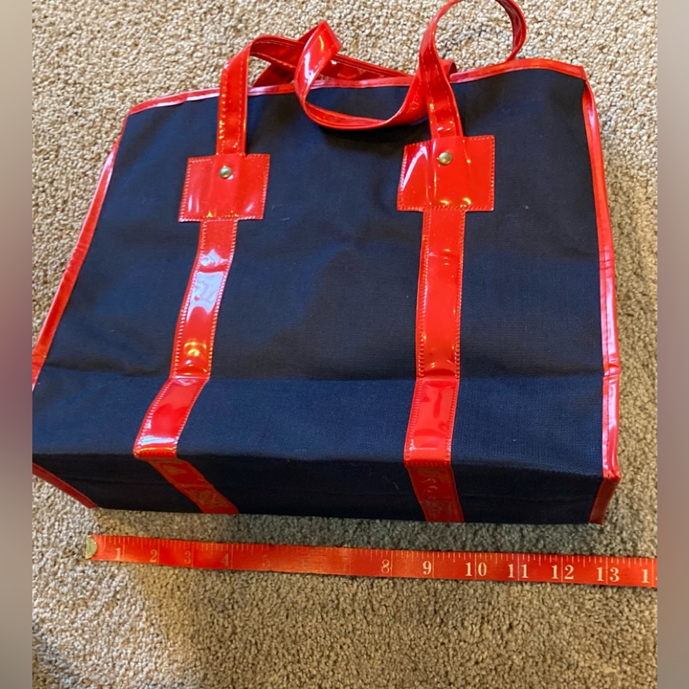 Vintage navy blue bag with red vinyl straps